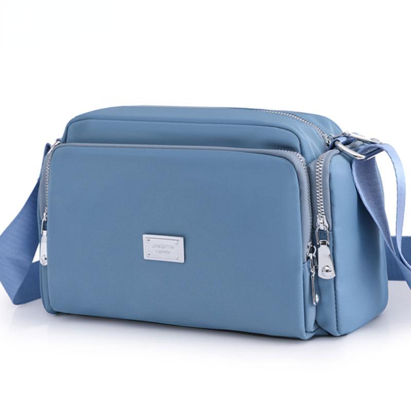RUWB BAGS Damestas Waterdichte nylon handtassen Pure kleur Mode Multifunctioneel Crossbody draagtas met grote capaciteit Casual Messenger Mum Bag helder roze
