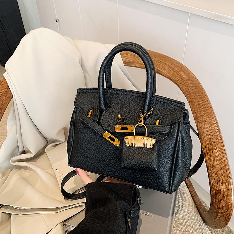 The Bags Family Mode Platinum tas Dames Herfst en Winter Eenvoudige Casual Veelzijdige Buitenlandse Stijl Schouder Messenger Bag Large 23.5 * 11.5 * 18 koffie