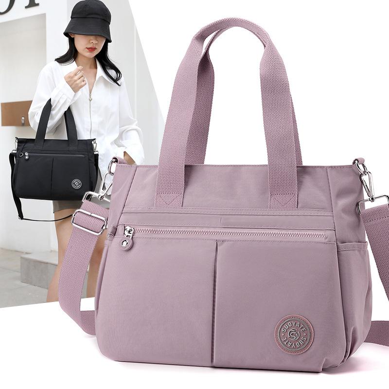 Kuluosidi Grote capaciteit Tote Bag Nylon Schoudertas Effen Kleur Dames Crossbody Tas Handtas met meerdere compartimenten lichtpaarse kleur