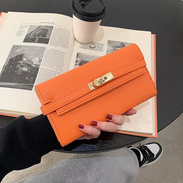 New boy 02 Vrouwen Zwarte Leren Turn Lock Leren Bifold Lange Portemonnee oranje