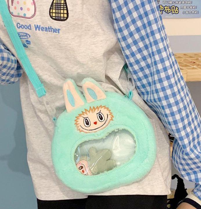 The warm winter labubu's new cartoon plush crossbody bag is a cute and plush birthday gift blauw