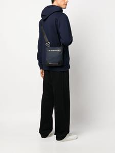 Tommy Hilfiger logo-lettering messenger bag - Blauw