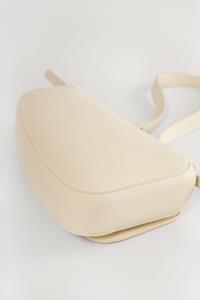 NA-KD Asymmetric Saddle Vrouwen Tas - Offwhite