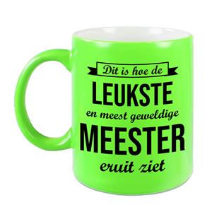 Bellatio Leukste en meest geweldige meester cadeau koffiemok / theebeker neon groen 330 ml -