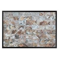 Klebefieber Fußmatte Naturmarmor Steinwand