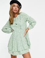 Edited Nette mini-jurk met stroken en groene madeliefjesprint