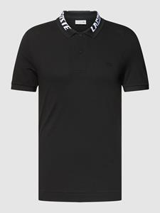 Lacoste Poloshirt met labelprint en logopatch, model 'EXCLUSIV'