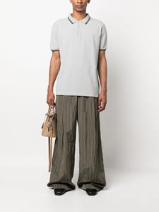 maisonmargiela Maison Margiela Poloshirt met gestreepte afwerking - Grijs