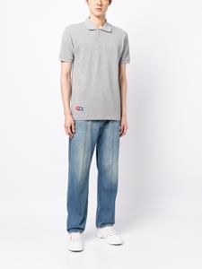 commedesgarçonsplay Comme Des Garçons Play Poloshirt met logopatch - Grijs