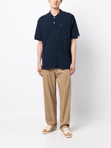 izzue Poloshirt met geborduurd logo - Blauw