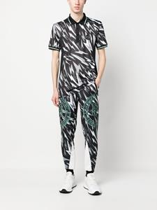pleinsport Plein Sport Poloshirt met bliksemflits print - Zwart