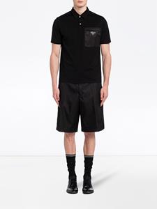 Prada Poloshirt met logo - Zwart