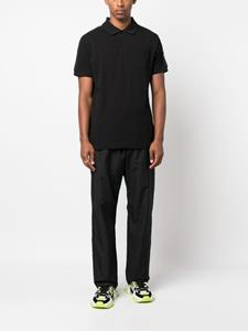 versacejeanscouture Versace Jeans Couture Poloshirt met logoband - Zwart