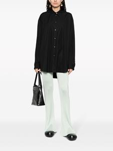 Jil Sander fully-pleated flared-leg trousers - Groen