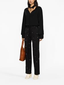 mm6maisonmargiela MM6 Maison Margiela paint-splatter effect tailored trousers - Zwart