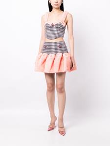 AREA Mini-rok met afwerking van imitatiebont - Roze