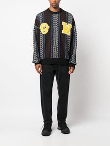 Jeans met toelopende pijpen - Zwart