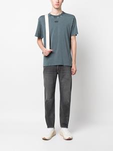 Jeans met toelopende pijpen - Zwart