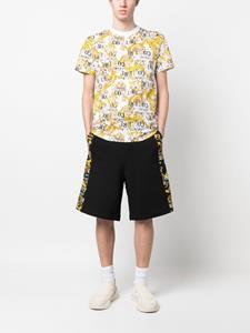 versacejeanscouture Versace Jeans Couture Shorts met barokprint - Zwart