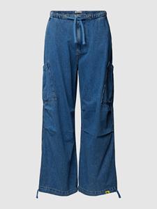 REVIEW Jeans met cargozakken