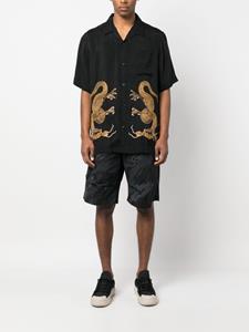 Maharishi Shorts met camouflageprint - Zwart