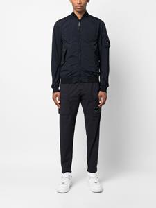 c.p.company C.P. Company Broek met logopatch - Blauw