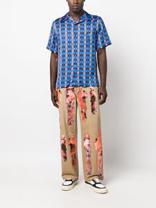 KidSuper Jeans met grafische print - Bruin
