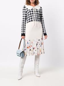chanelpre-owned CHANEL Pre-Owned 1990s plooirok met Mademoiselle print - Beige