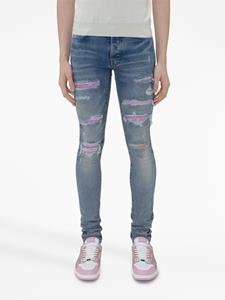 AMIRI Gerafelde jeans - Blauw