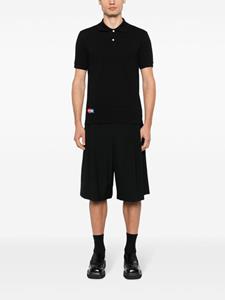 commedesgarçonsplay Comme Des Garçons Play x Invader poloshirt met logopatch - Zwart