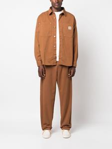 carharttwip Carhartt WIP Jeans met logopatch - Bruin