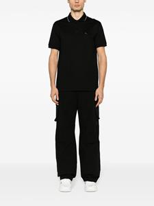 Versace Poloshirt verfraaid met logo - Zwart