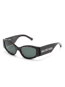 balenciagaeyewear Balenciaga Eyewear Rive Gauche zonnebril met cat-eye montuur - Bruin