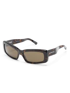 balenciagaeyewear Balenciaga Eyewear Zonnebril met schildpadschild design en oversized montuur - Bruin