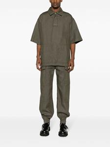 alexandermcqueen Alexander McQueen Denim poloshirt met geborduurd logo - Groen