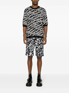 Moschino Shorts met monogramprint - Zwart