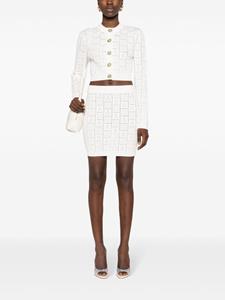 Balmain pointelle-knit monogram miniskirt - Wit