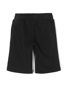 moschinokids Moschino Kids Katoenen trainingsshorts met logoprint - Zwart