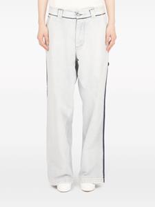 maisonmargiela Maison Margiela Mid waist jeans met wijde pijpen en contrasterende afwerking - Blauw