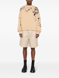 Moschino Sweater met logoprint en verfspatten - Beige