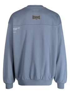 izzue Reversed katoenen sweater met print - Blauw