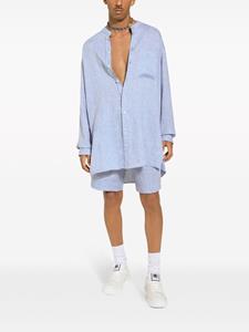 dolce&gabbana Dolce & Gabbana Linnen shorts met knoopssluiting - Blauw