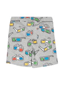 stellamccartneykids Stella McCartney Kids Trainingsshorts van biologisch katoen met zonnebrilprint - Grijs