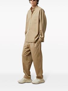 Gucci Trainingsbroek met geborduurd logo - Beige