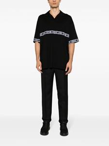versacejeanscouture Versace Jeans Couture Poloshirt met logoband - Zwart