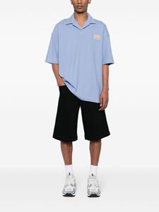 versacejeanscouture Versace Jeans Couture Katoenen poloshirt met logo-applicatie - Blauw