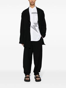 yohjiyamamoto Yohji Yamamoto Broek met toelopende pijpen - Zwart