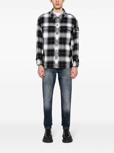 calvinkleinjeans Calvin Klein Jeans Jeans met toelopende pijpen - Blauw