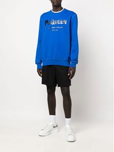 Alexander McQueen Sweater met graffiti-print - Blauw