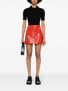 Courrèges Iconic ribgebreid poloshirt - Zwart